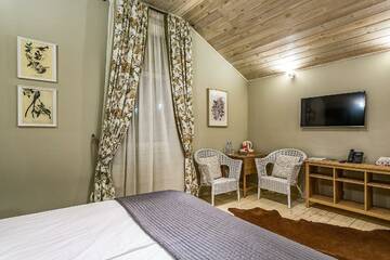 Фото номера Standard Chalet (мансарда) Гостиница «Арт Вилладж» г. Химки 7